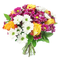 Against a spotless white background, a vibrant, rounded bouquet fills the frame, every stem and petal positioned with the care of an experienced Stanmore florist. Several generous bi-colour roses anchor the design, their centres glowing a sunny golden yellow that gradually melts into warm orange and subtle reddish tones towards the petal edges, giving the impression of small flames gently flickering among the other flowers. Around and between them, crisp white daisy-like chrysanthemums create a sense of air and clarity, each bloom defined by a luminous lime-green centre that adds a fresh, almost zesty contrast to the deeper shades. Rich clusters of magenta and fuchsia chrysanthemums, with their dense, many-layered petals and yellow-green hearts, bring drama and depth, echoing the vivid colours you might see in front gardens around Stanmore Broadway in early autumn. Lush, dark green foliage, reminiscent of ruscus, weaves through the bouquet, breaking up the brighter hues with glossy leaves that give the design a natural, garden-inspired rhythm. The composition forms a generous dome, the flowers closely gathered, while the bound stems at the bottom are clearly visible, suggesting a freshly hand-tied bouquet just lifted from the workbench and ready for local delivery. Soft, even lighting accentuates the textures without overwhelming the colours, allowing the interplay of yellow, orange, white, magenta, and green to shine. This arrangement radiates easy happiness and thoughtful care, perfectly suited to sending congratulations to a friend near Canons Park, brightening a new home, or adding a welcoming touch to a family celebration in Stanmore.