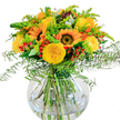This cheerful bouquet captures the summery spirit of Stanmore in every radiant detail. Bold sunflowers, alive with yellow-orange petals and deep brown centers, form the focal point-much like the golden blooms seen dancing in Stanmore's green spaces. Velvet-soft yellow garden roses, tightly furled and decadently layered, add sophistication and depth, recalling the classic elegance of homes on Old Church Lane. Scarlet Hypericum berries lend playful splashes of colour, peeking out from a profusion of feathery ferns and finely textured goldenrod, their lively forms softening the overall design. Eucalyptus leaves woven into the bouquet infuse subtle notes of blue-green and a fresh aroma that hints at walks through nearby woodland. Everything is arranged in a modern, bowl-shaped glass vase, where the tangle of stems and clarity of the water enhance the bouquet's natural vibrancy. Whether delivered for a special occasion, a thoughtful gift, or simply to bring sunshine into a Stanmore kitchen or sitting room, this arrangement celebrates the beauty and warmth of the local community-crafted with care, passion, and a florist's eye for perfect harmony.